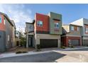 Contemporary two-story home with a two-car garage and modern design elements enhancing the curb appeal at 3217 Bertonico Ave, Henderson, NV 89044