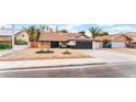 Charming single-story home with a well-manicured front yard and a spacious driveway at 3409 El Cortez Ave, Las Vegas, NV 89102