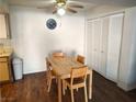 Bright dining area with wood floors, table with seating for four, and closet at 3550 Bay Sands Dr # 2016, Laughlin, NV 89029