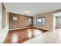 Spacious living room featuring stylish hardwood floors and neutral wall colors at 5505 Criollo Dr, Las Vegas, NV 89122