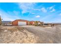 Charming single-story home with desert landscaping and a spacious two-car garage at 6661 Gallup Ct, Pahrump, NV 89060