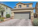 Charming home featuring a two-car garage and a paved driveway surrounded by low-maintenance landscaping at 7154 Brighton Village St, Las Vegas, NV 89166