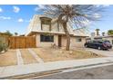 Charming two-story home featuring a unique roofline and private driveway at 816 Antigua St, Las Vegas, NV 89145