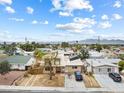 A unique two-story home with a front yard and a convenient private driveway at 816 Antigua St, Las Vegas, NV 89145
