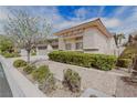 Charming single-story home featuring a well-maintained yard with gravel landscaping and mature trees at 3658 Auckland Castle St, Las Vegas, NV 89135