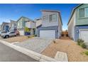 Charming two-story home featuring modern design, a two-car garage, and low maintenance landscaping at 3736 Paseo De Paz Ave, Las Vegas, NV 89115