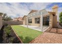 Beautiful backyard features a pergola, low maintenance landscaping and privacy at 5828 Red Gull St, Las Vegas, NV 89149