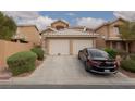 Inviting home with a two-car garage and well-maintained desert landscaping at 8008 Draco Cir # 201, Las Vegas, NV 89128