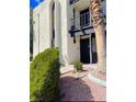 Well-maintained two-story condo featuring a small private balcony and mature trees at 1440 Vegas Valley Dr # 1, Las Vegas, NV 89169
