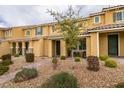 Charming townhome featuring a covered porch, desert landscaping, and easy access to community amenities at 2878 Starling Summit St, Henderson, NV 89044