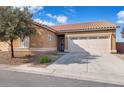 A single story home featuring a well-kept lawn and attached two car garage at 3792 Calle De Rio Ave, Las Vegas, NV 89115