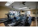 Well-equipped gym with treadmills, elliptical machines, and weightlifting equipment at 231 W Horizon Ridge Pkwy # 314, Henderson, NV 89012