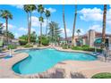 Inviting community pool with clear blue water and ample lounge space at 2714 Bridgepointe Dr, Las Vegas, NV 89121