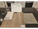 Selections for the kitchen showing white cabinets, sleek chrome faucet, and quartz countertop at 4145 Texas Lilac Ave, Las Vegas, NV 89139