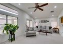Comfortable living room featuring neutral tones, vaulted ceilings, and ample seating at 2136 Eagle Sticks Dr. Dr, Henderson, NV 89012
