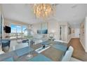 This open-plan living space offers a dining area with modern light fixtures and decor, and city views at 2700 Las Vegas Blvd # 1803, Las Vegas, NV 89109