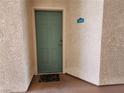 Private entrance to unit 3077 with a secure, stylish door and a 'Welcome' mat at 3550 Bay Sands Dr # 3077, Laughlin, NV 89029