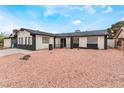 Welcoming single-story house boasting unique rock landscaping and inviting curb appeal at 3915 Delling Ct, Las Vegas, NV 89104