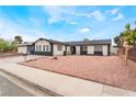 Attractive single-story home showcasing unique yard and well-maintained landscaping at 3915 Delling Ct, Las Vegas, NV 89104