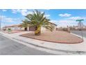 Charming house featuring a palm tree, a driveway, and a terracotta-tiled roof at 4712 Belshire Dr, Las Vegas, NV 89147