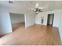 Spacious living room with tiled flooring, ceiling fan and fresh paint at 524 Bedford Rd, Las Vegas, NV 89107