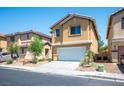 Inviting two-story home with a well-manicured front yard and desert landscaping at 6476 Ness Gardens Ct, Las Vegas, NV 89122