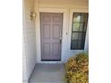 Welcoming front door with sidelight and covered entry, perfect for greeting guests at 149 Cologne Ct, Henderson, NV 89074