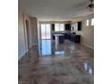 Bright, open-concept with tile flooring and modern fixtures perfect for entertaining and relaxation at 2748 Brinkley Manor St, Laughlin, NV 89029