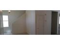 Bright foyer with tile flooring, leading to the staircase at 3883 Winter Whitetail St, Las Vegas, NV 89122
