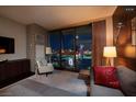 Stylish bedroom showcasing city views, modern furnishings, and contemporary interior design elements at 4381 W Flamingo Rd # 24304, Las Vegas, NV 89103