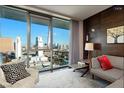 Bright bedroom offering an open window view, modern furnishings, and stylish decor at 4381 W Flamingo Rd # 24304, Las Vegas, NV 89103