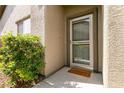 Inviting entryway featuring a glass-paneled door and a 'Welcome' mat at 11253 Piper Peak Ln, Las Vegas, NV 89138
