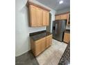Kitchen featuring granite countertops and stainless steel appliances at 1209 Equator Ave, North Las Vegas, NV 89032