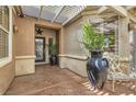 Inviting courtyard entrance with decor and covered pergola at 2743 Evergreen Oaks Dr, Henderson, NV 89052