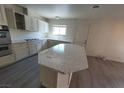 Bright kitchen features updated countertops, stainless appliances, and ample cabinet space at 3749 Ponderosa Ave, Las Vegas, NV 89115