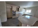 Bright kitchen features updated countertops, stainless appliances, and ample cabinet space at 3749 Ponderosa Ave, Las Vegas, NV 89115