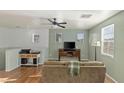 Comfortable living space with hardwood floors, a ceiling fan, and generous natural light at 4350 Westbury Square St # 3, North Las Vegas, NV 89032