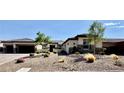 Charming single-story home with desert landscaping and a two-car garage at 9511 Star Vista Ct, Las Vegas, NV 89149