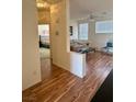 Bright living room featuring hardwood floors and comfortable seating arrangement at 10516 Angel Dreams Ave, Las Vegas, NV 89144