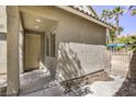 Inviting front entry with a covered porch, offering a warm welcome and curb appeal at 11215 Piazzale St, Las Vegas, NV 89141