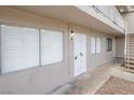 Exterior shot of the apartment building with stairs to upper units and access to unit 2 at 204 Orland St # 2, Las Vegas, NV 89107