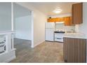 Cozy kitchen with white appliances and laminate countertops at 204 Orland St # 2, Las Vegas, NV 89107