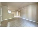 Spacious living room featuring neutral paint and tile flooring at 2615 W Gary Ave # 2051, Las Vegas, NV 89123