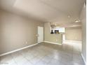 Open-concept living room with tile flooring and view of kitchen at 2615 W Gary Ave # 2051, Las Vegas, NV 89123