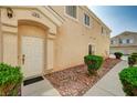 Charming front entrance with a neatly landscaped yard at 6404 Extreme Shear Ave # 103, Henderson, NV 89011