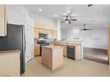 Open kitchen featuring stainless steel appliances and a center island at 7033 Red Tide Dr, Las Vegas, NV 89131