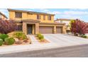 Charming two-story home with desert landscaping and a wide driveway, perfect for Gathering living at 8112 Sapphire Sea St, North Las Vegas, NV 89085