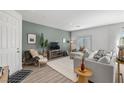 Inviting living room with stylish decor, comfortable seating, and ample natural light at 207 Callen Falls Ave # 1713, Henderson, NV 89011