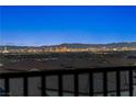 Striking Las Vegas city view at night highlighting the rooftops and mountains at 4576 Amazing View St, Las Vegas, NV 89129