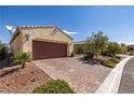Inviting single-story home with a spacious two-car garage and low-maintenance desert landscaping at 5524 E San Pietro Dr, Pahrump, NV 89061